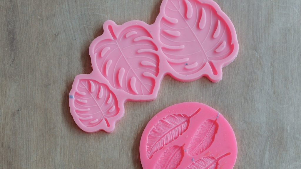 Two silicone molds for baking.